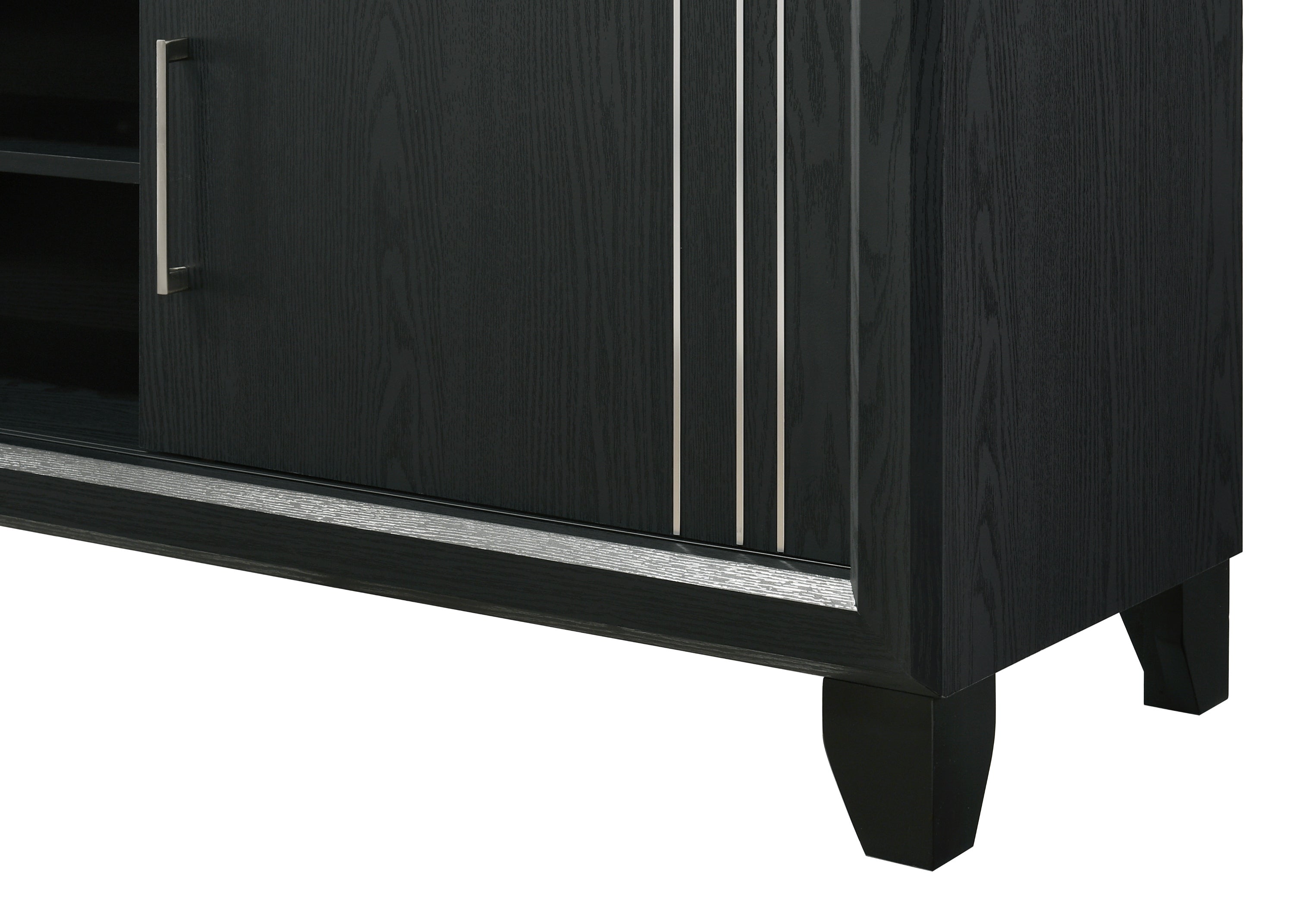 Close-up of charcoal wood TV stand showing silver hardware and vertical metal accents on the cabinet door for a modern look.