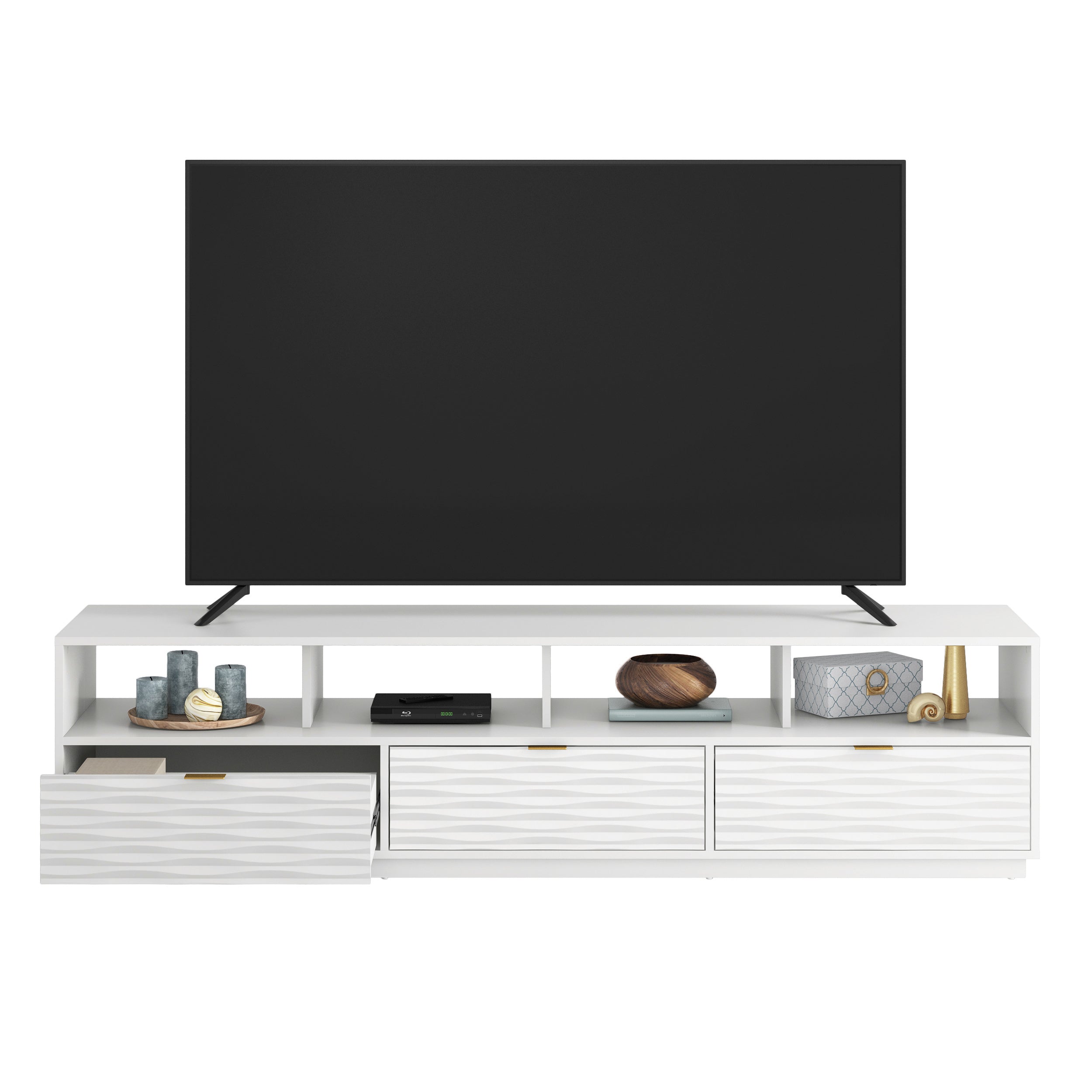 White media console with one drawer open, displaying organized storage space for blankets and accessories under a mounted TV.