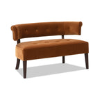 Angled view of Burnt Orange Velvet Bench Settee highlighting its rolled arms, tufted upholstery, and sleek mid-century design.