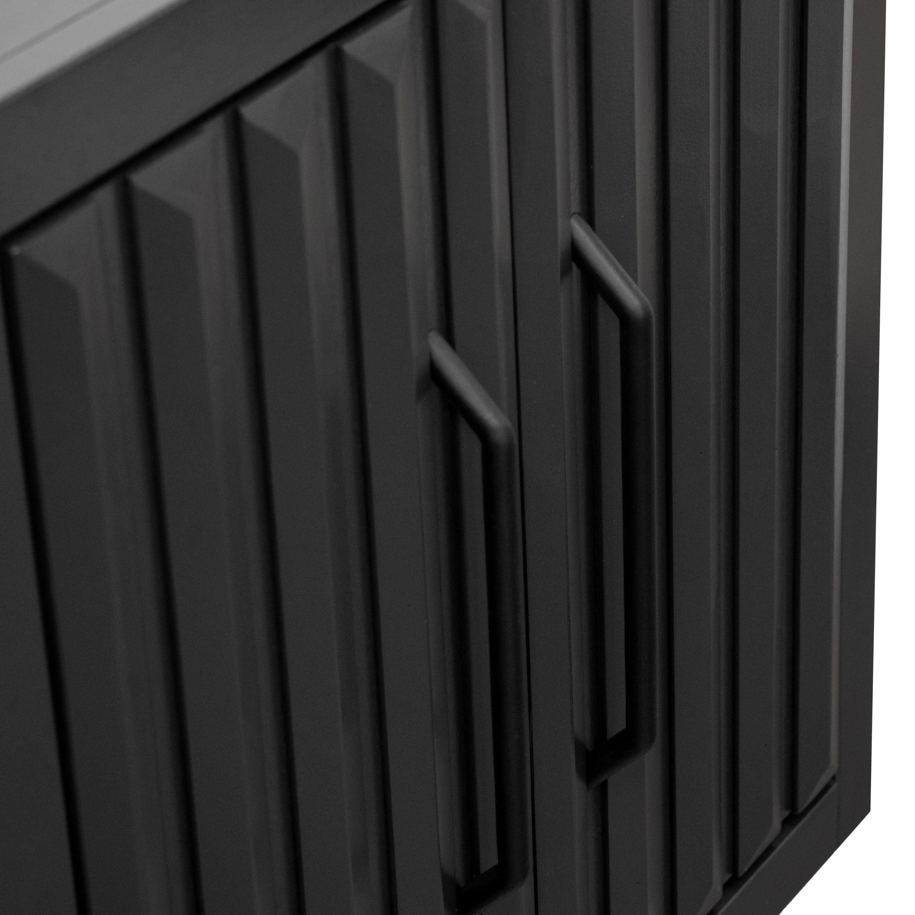 Close-up of black cabinet door handles and textured paneling. 64 inch fully assembled cabinet with modern design.