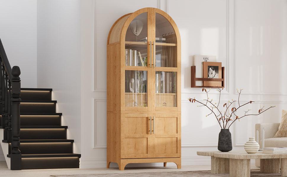 Arched kitchen pantry cabinet placed in a modern living space, blending functional storage with elegant design.