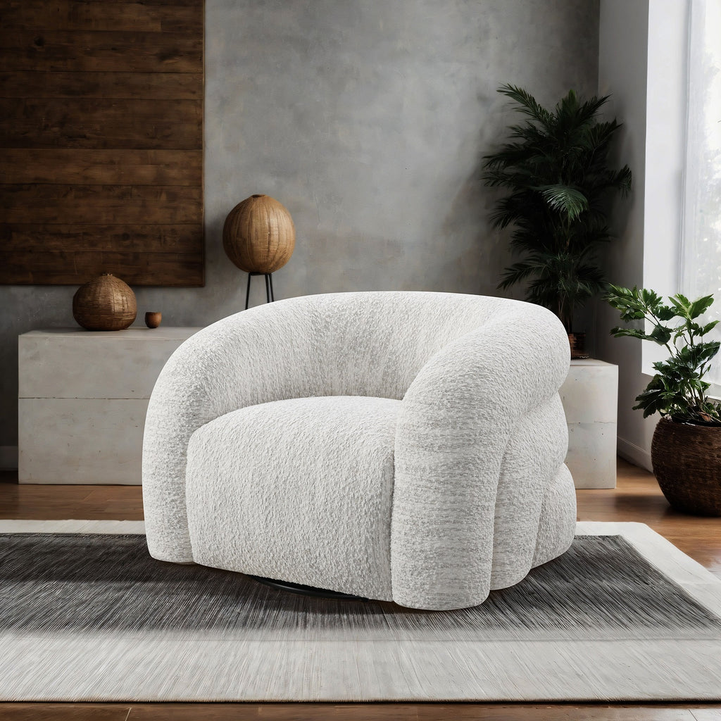 Modern living room featuring the White Swivel Chair Contemporary with sculptural form, boucle texture, and 360-degree swivel base.