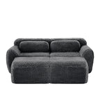 Front view of Plush Modular Sofa Dark Grey with ottoman and pillows, highlighting its cozy plush fabric and modular layout.