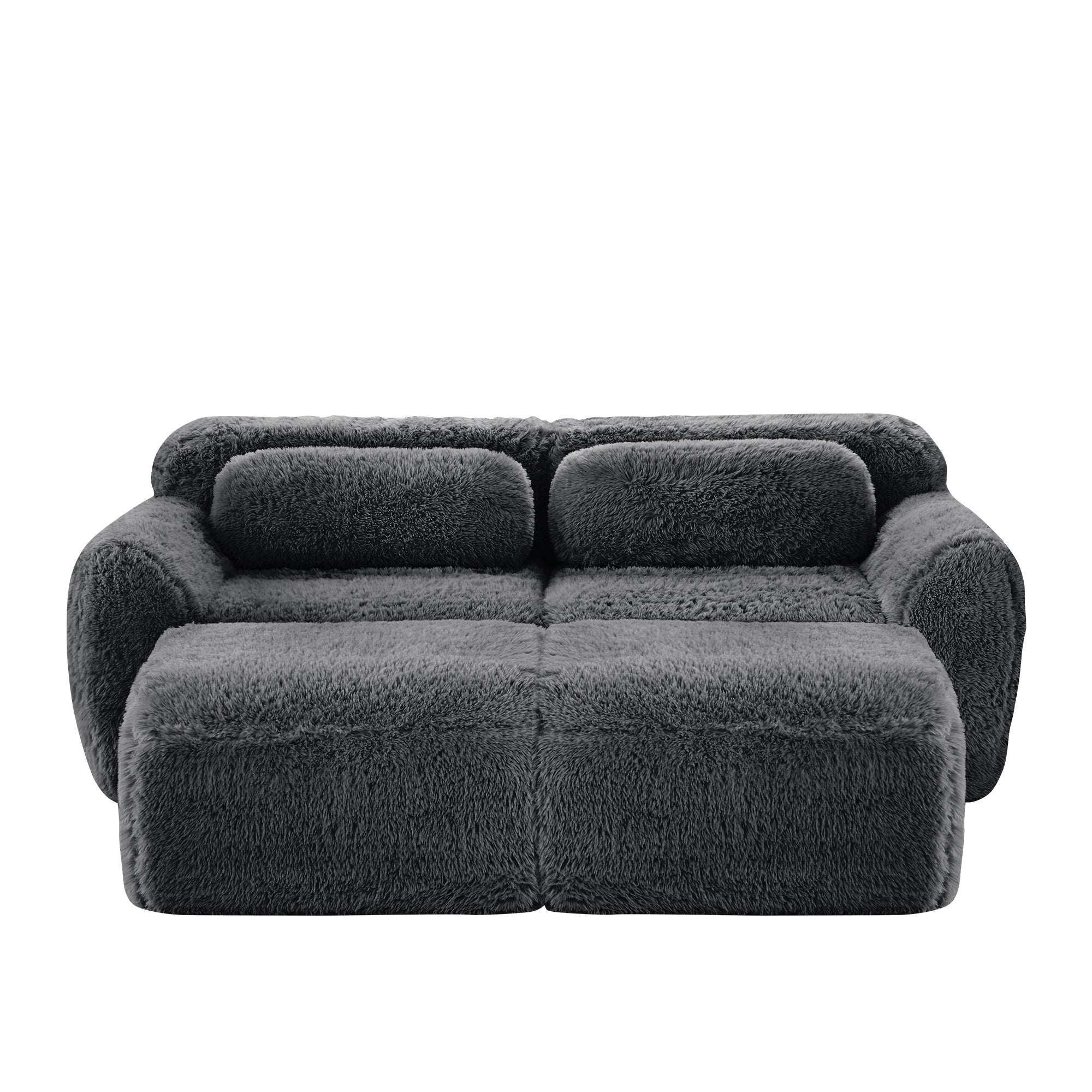 Front view of Plush Modular Sofa Dark Grey with ottoman and pillows, highlighting its cozy plush fabric and modular layout.
