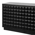 Detailed view of 3D geometric door panels and metal trim on the 4-Door Storage Cabinet, highlighting modern design.