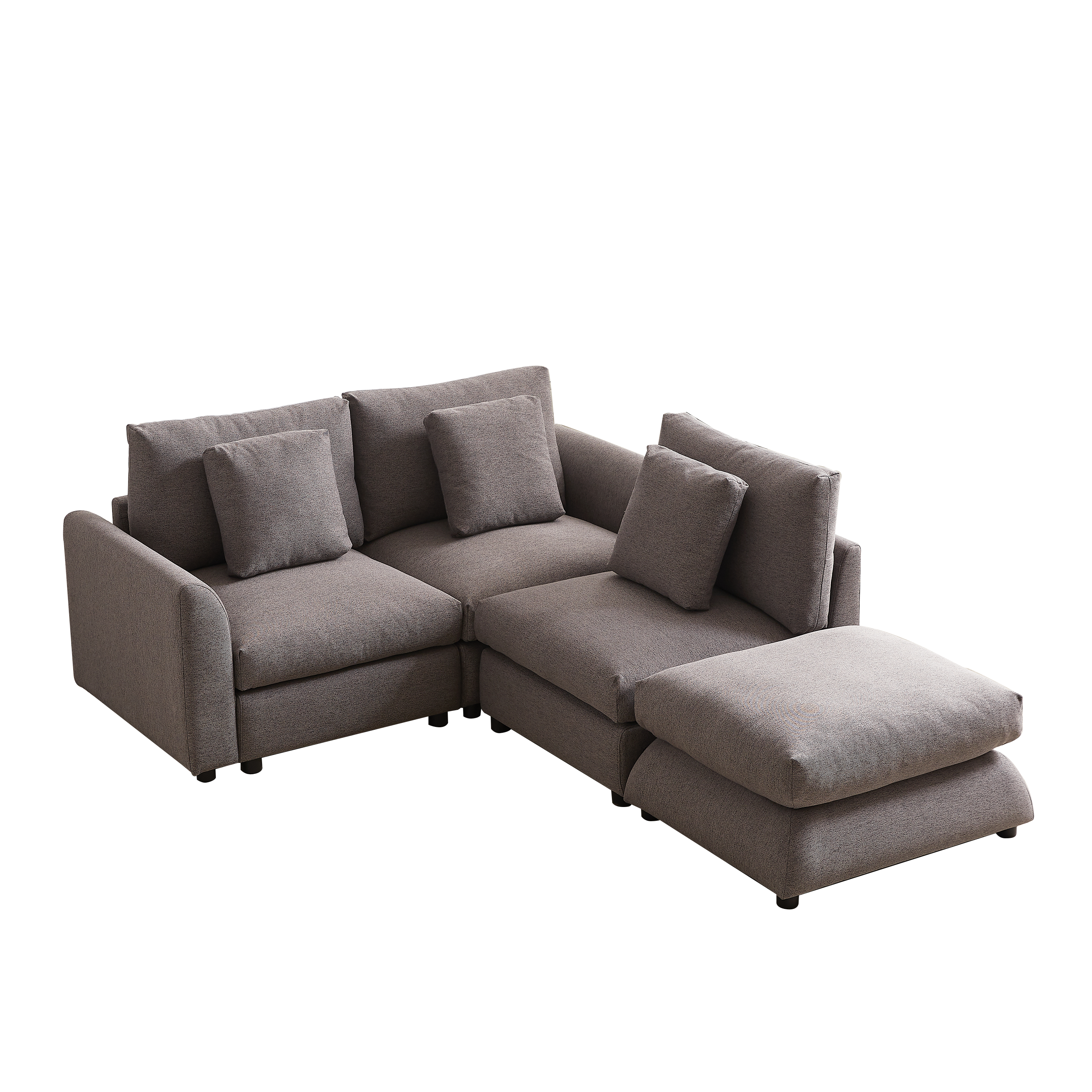 L-shaped modular sofa with ottoman, upholstered in gray fabric, featuring three seat cushions and four pillows for customizable comfort.