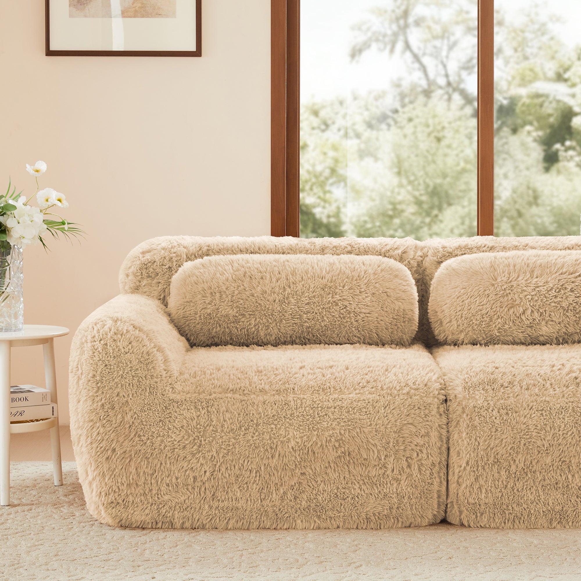 Close-up of Modular L-shaped Sofa armrest and cushion in plush light khaki fabric, highlighting its cozy and modern design.