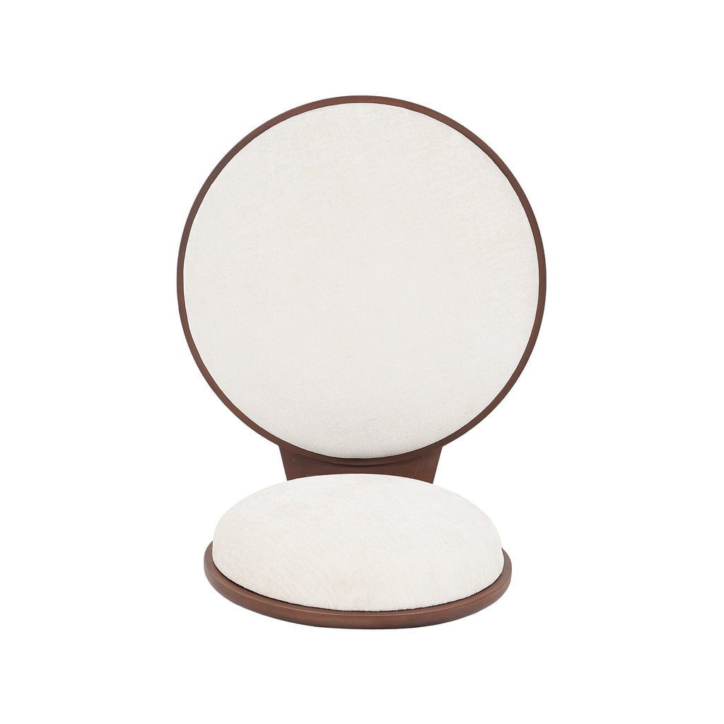 Close-up of a single beige dining chair seat and backrest detached from frame. Showcases soft fabric and circular design.