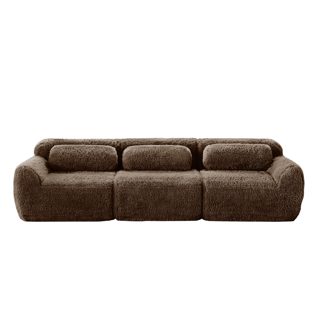 Front view of 114'' modular sofa in chocolate plush, showcasing its soft, no-assembly design and modern aesthetic.
