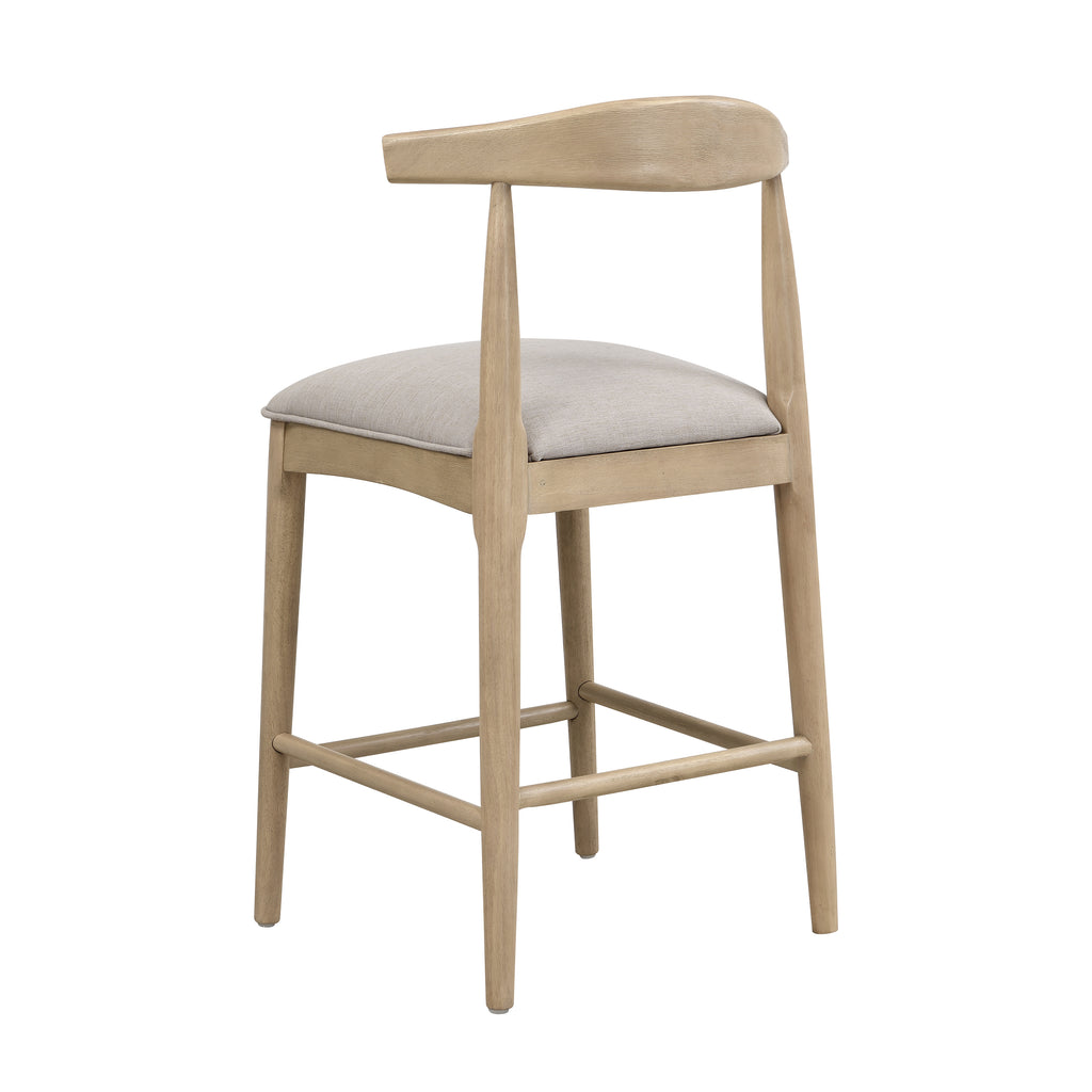 Rear angled view of modern counter stool with pebble fabric seat and sculpted rubberwood frame, blending comfort and style.