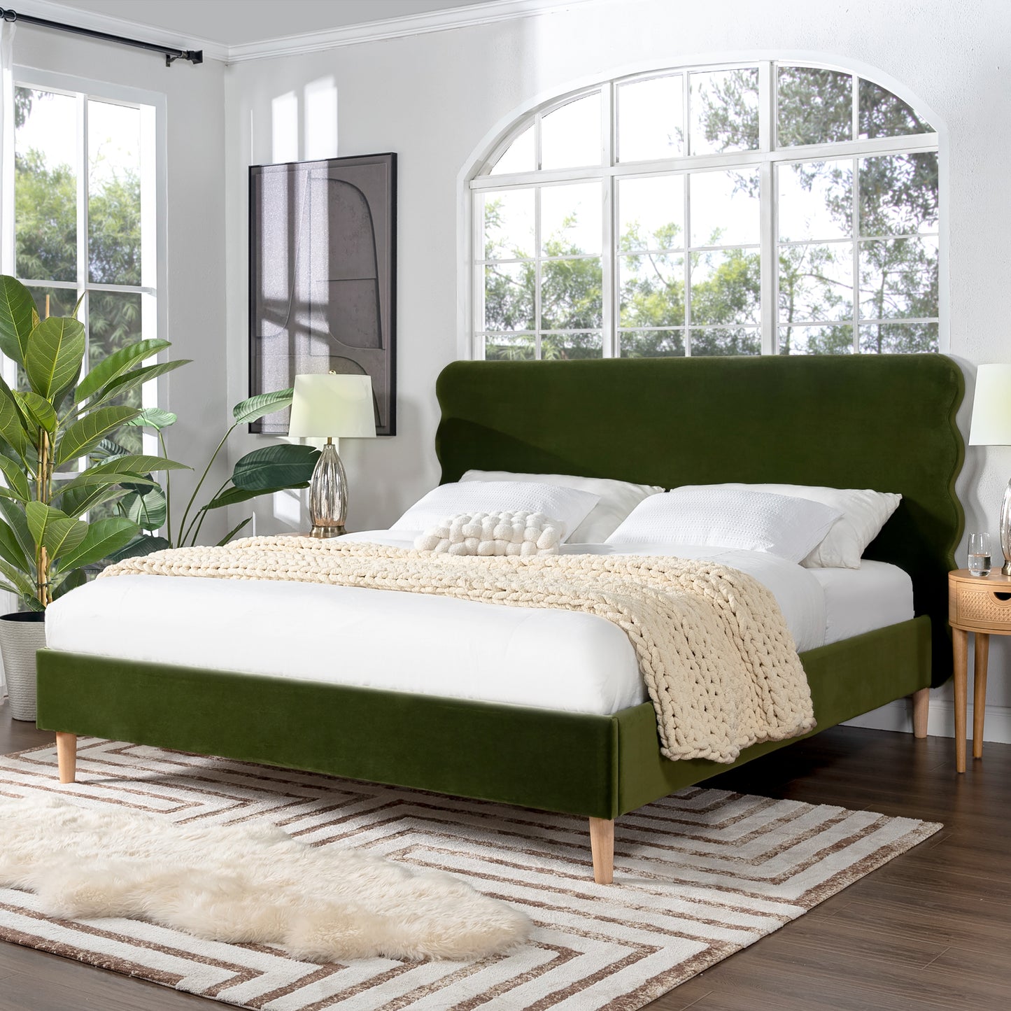 King size olive green platform bed with wavy headboard in modern bedroom setting, Stockholm Modern design with wood legs and velvet upholstery.