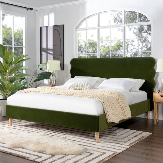 King size olive green platform bed with wavy headboard in modern bedroom setting, Stockholm Modern design with wood legs and velvet upholstery.
