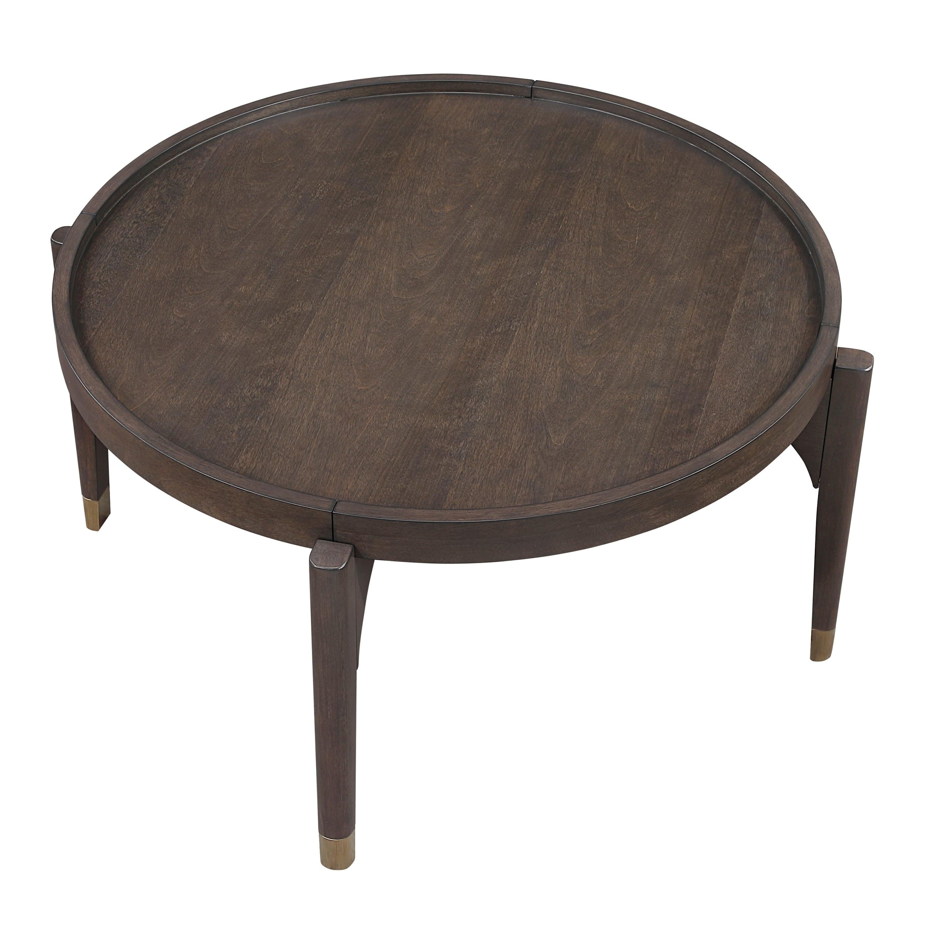 Dark Brown Cocktail Table with Gold Tip Legs.
