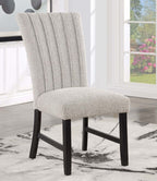 Single gray boucle dining chair with wood legs and tufted backrest from the Genuine Marble Dining Table Set.