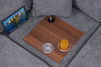 Close-up of built-in wood tray with USB port and cupholders on light gray chenille sectional. Perfect for charging devices and holding drinks.