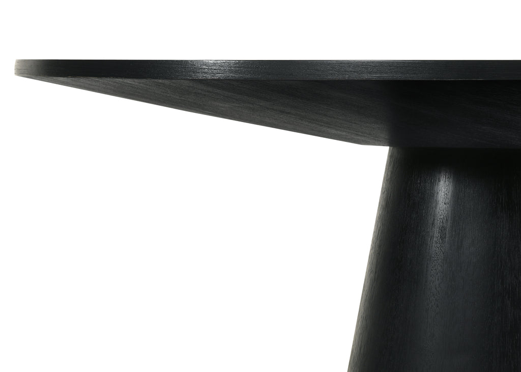 Detail of Jasper dining table edge and pedestal base in ebony black wood. Smooth finish with modern silhouette.