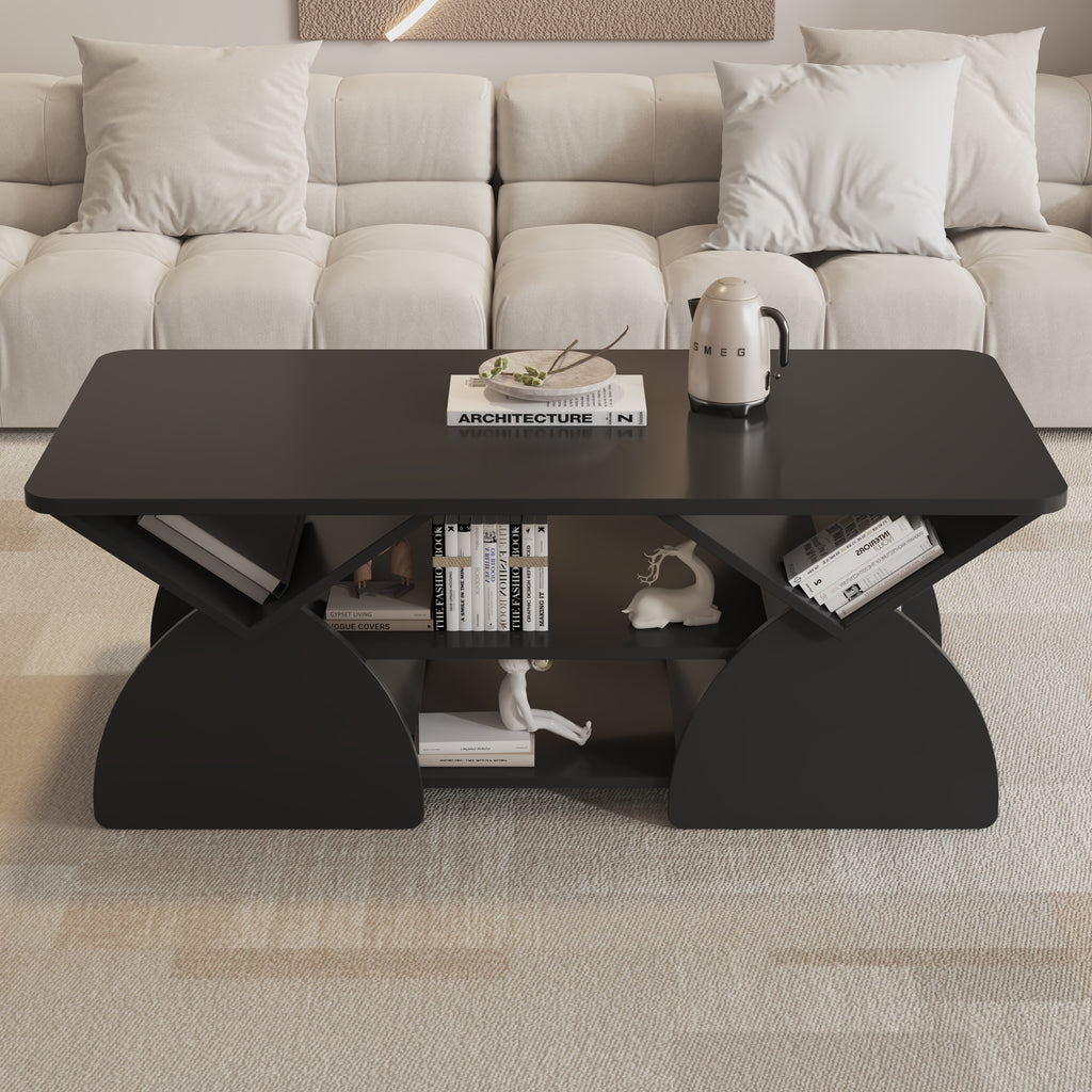 Front view of engineered coffee table with wood storage and geometric design, showcasing books and decorative items.