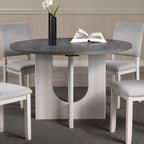5pc dining set with gray upholstered chairs and round table.