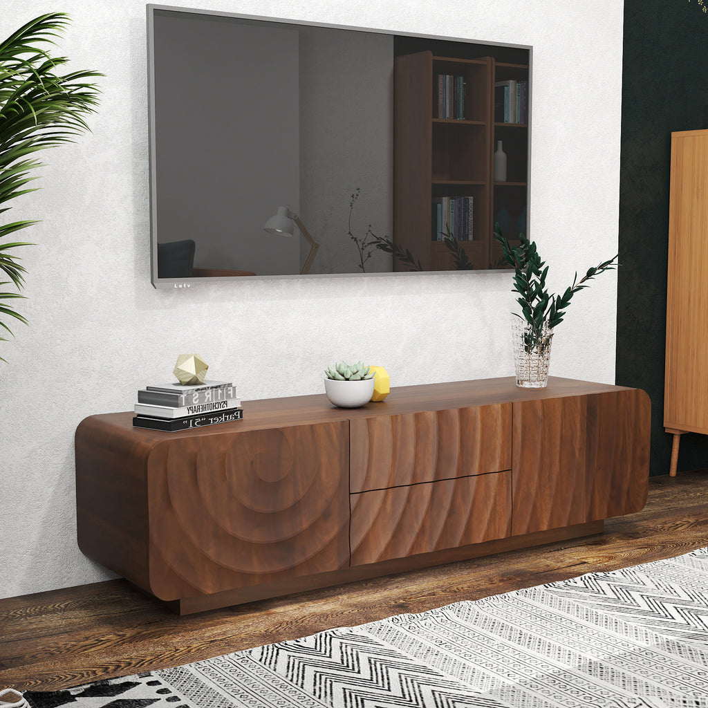 Walnut mid-century TV console with unique spiral wave texture, two drawers, and storage cabinet under a wall-mounted TV.
