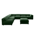 Modern 6-piece modular sectional in soft green chenille with cylindrical bolsters and a matching storage ottoman.