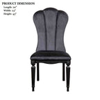 Black dining room side chair with fluted legs shown with dimensions: 20" length, 23" width, 43" height.