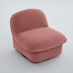 Top angled view of Coral Swivel Accent Chair showing plush velvet cushioning and armless design for versatile seating.