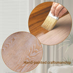 Hand-painted craftsmanship process shown on rustic carved wood coffee table, highlighting artisanal quality and natural wood finish.