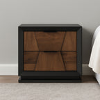 Modern walnut nightstand with 2 drawers in traditional style, placed beside a bed. Features geometric drawer fronts and black frame.