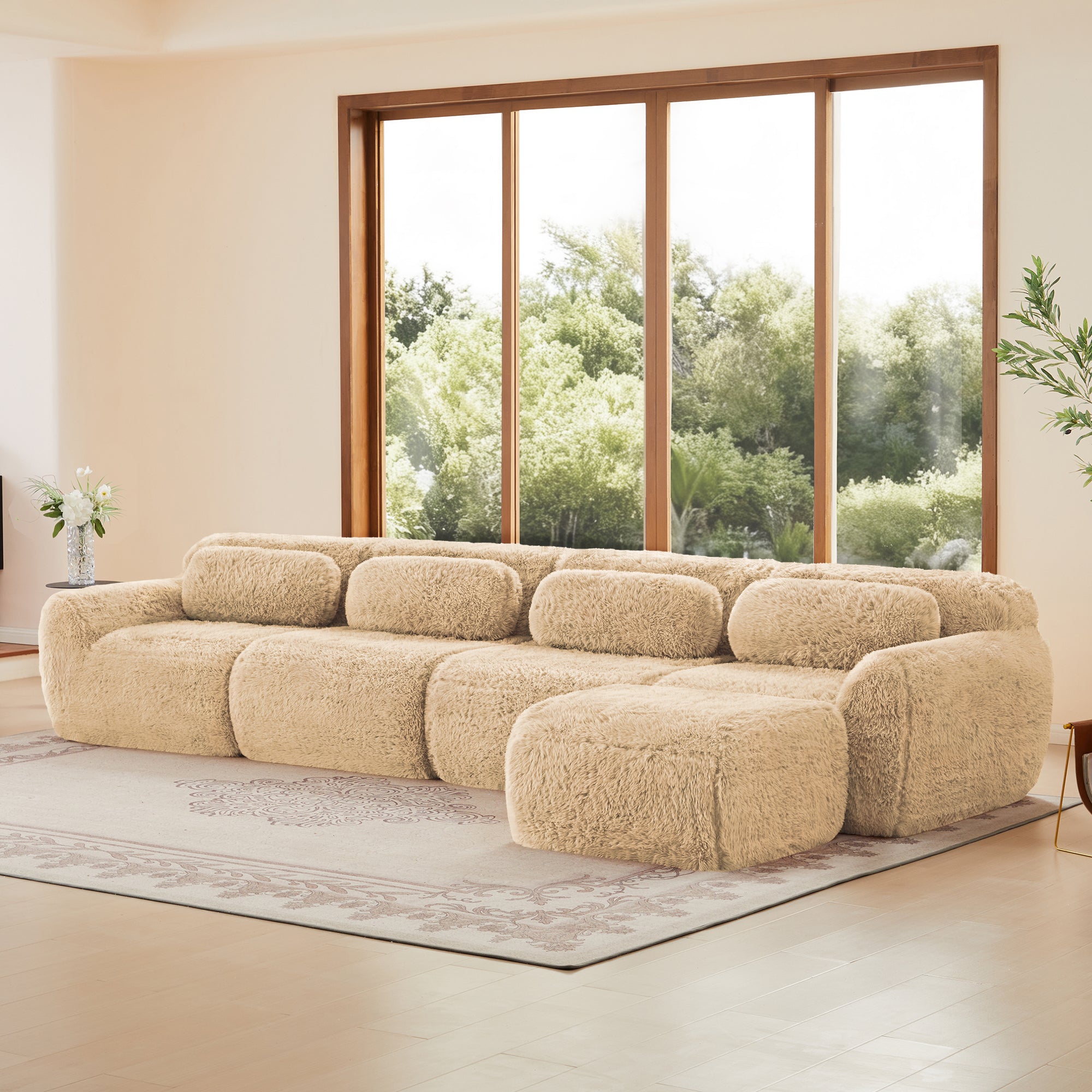 Plush Fabric Modular L-shaped Sofa in light khaki with no assembly, shown in a bright living space with large windows and greenery.
