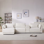 Front view of L-Shaped sectional sofa with storage and charging, styled in a cozy living room with modern decor and soft lighting.