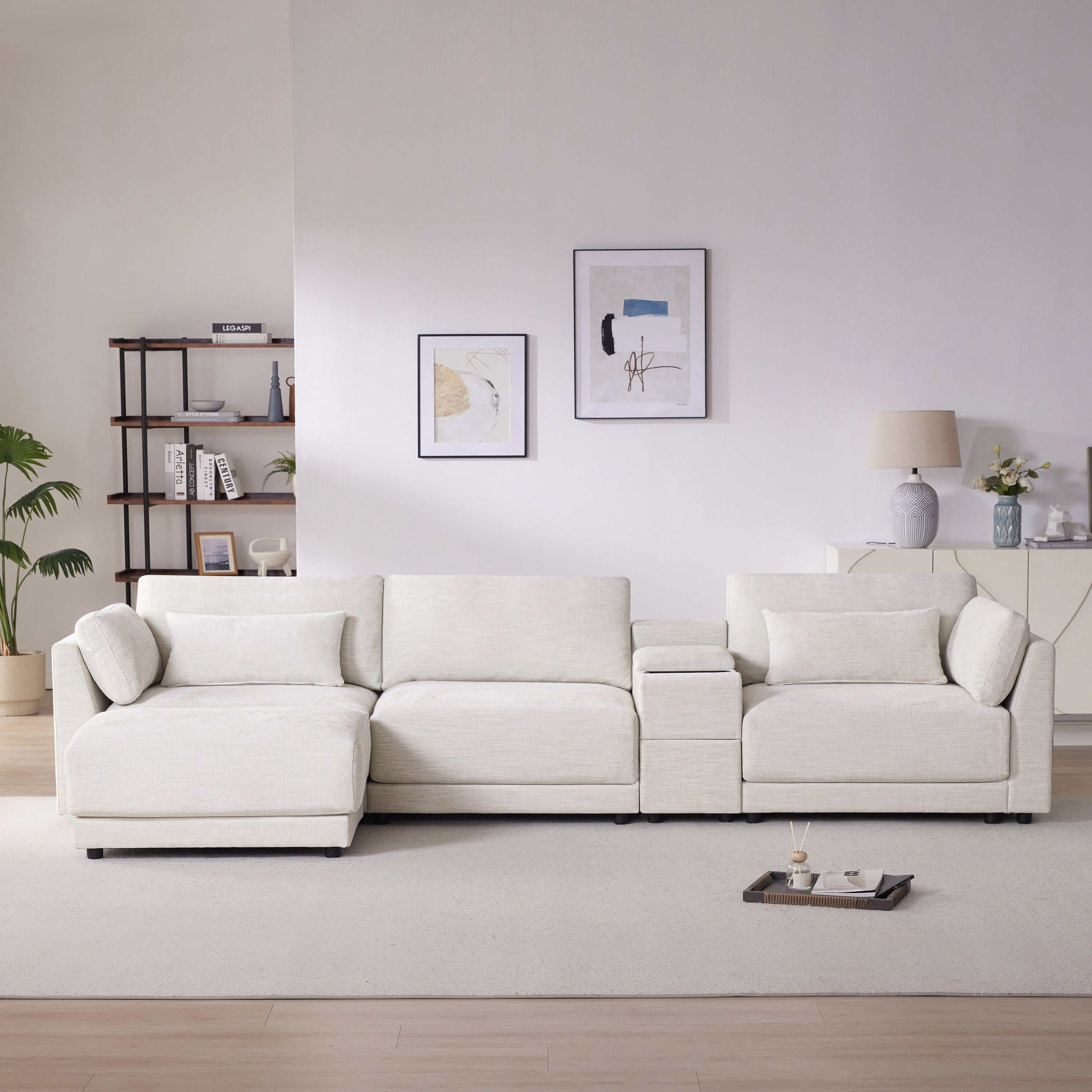 Front view of L-Shaped sectional sofa with storage and charging, styled in a cozy living room with modern decor and soft lighting.