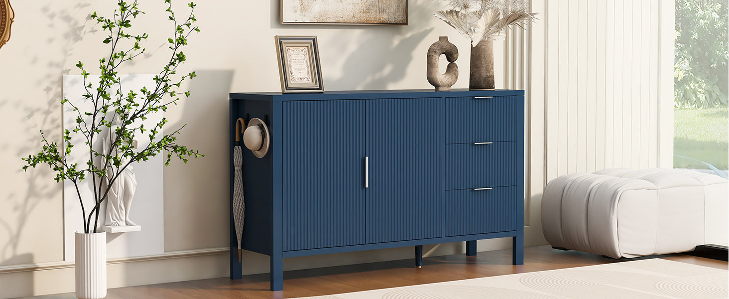 Navy sideboard storage cabinet in a bright living space, showcasing modern design with dual hooks and decorative top surface.
