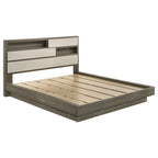 Modern California king bed in grey oak and almond wood with a built-in shelving headboard and slatted frame.