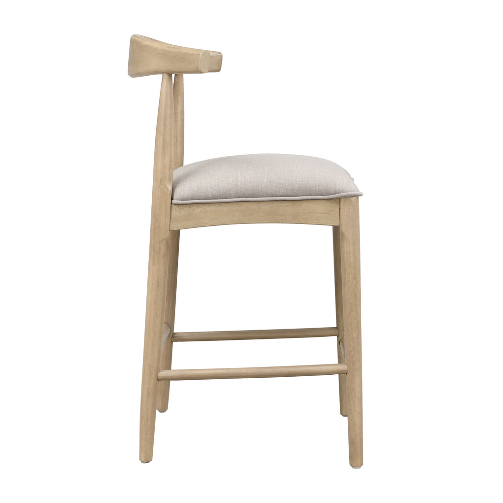 Side profile of modern counter stool featuring contoured backrest and padded seat in pebble fabric, supported by a sturdy rubberwood frame.