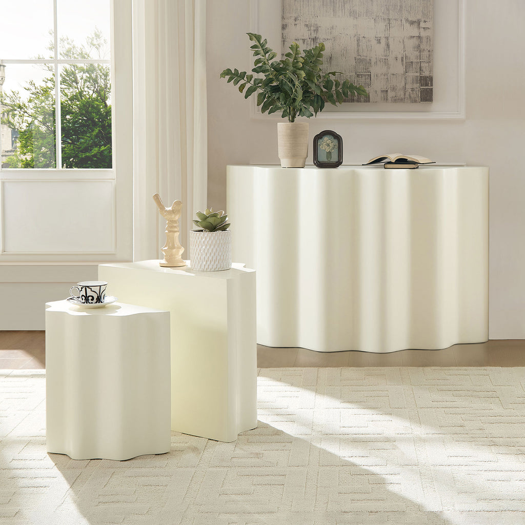 Modern cream-colored fiberglass side and console table set featuring a minimalist, wavy-edged sculptural design.