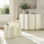 Modern cream-colored fiberglass side and console table set featuring a minimalist, wavy-edged sculptural design.