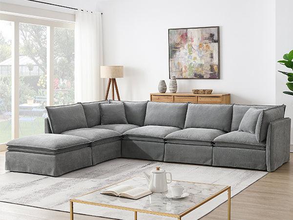 Modular sectional sofa with 6 seats and ottoman in a bright living room, offering spacious comfort and modern style.