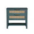 Teal bohemian nightstand with two rattan-inlay drawers, gold handles, and an open storage shelf.