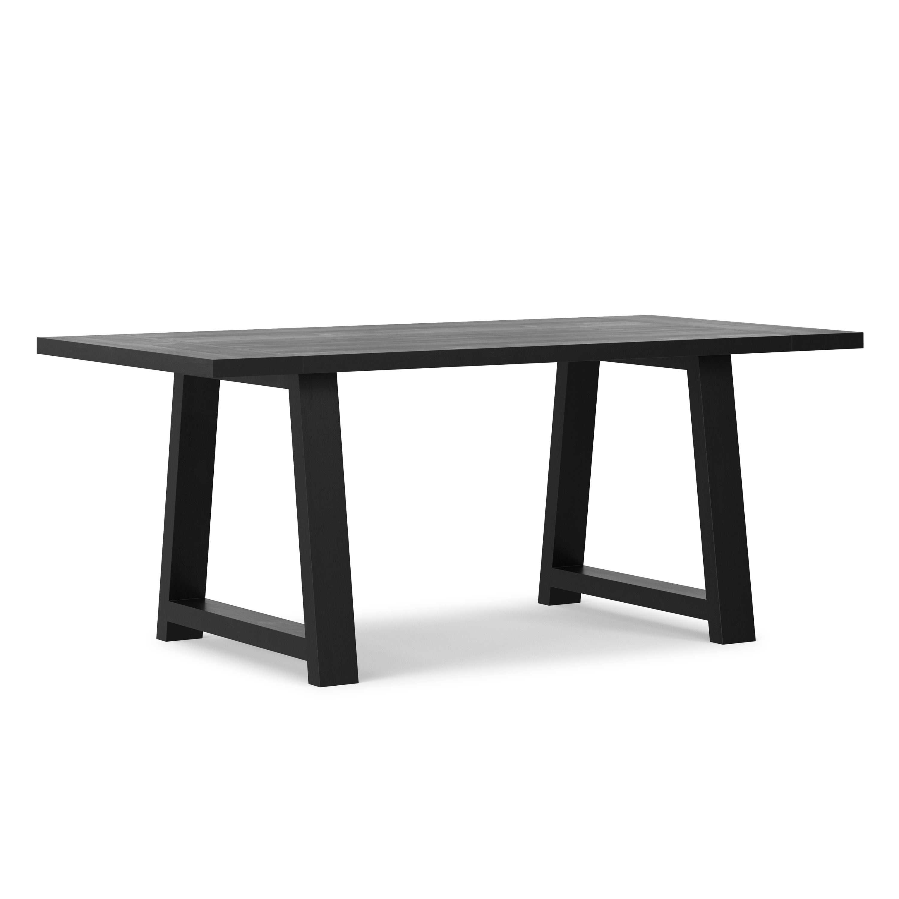 Angled view of Whitley Dining Table - Black Wooden Table with sturdy trestle legs and smooth mango wood surface.