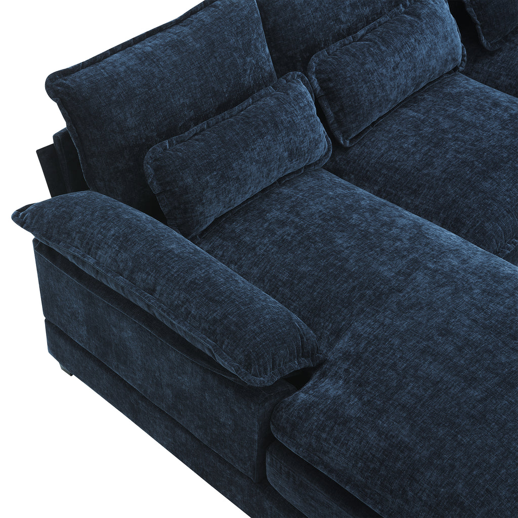 Close-up of chenille fabric and cushioned seating on U-shaped sectional sofa with USB charger, offering luxurious comfort and support.