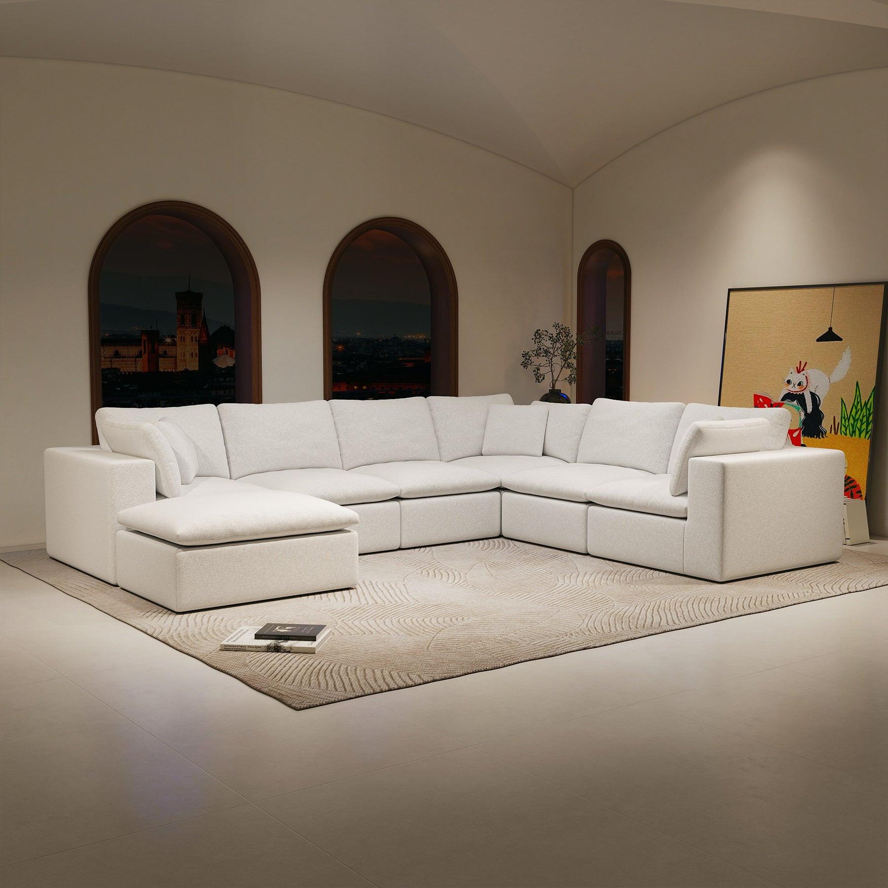 Comfortable Modular Sectional Sofa in White Plush Fabric.