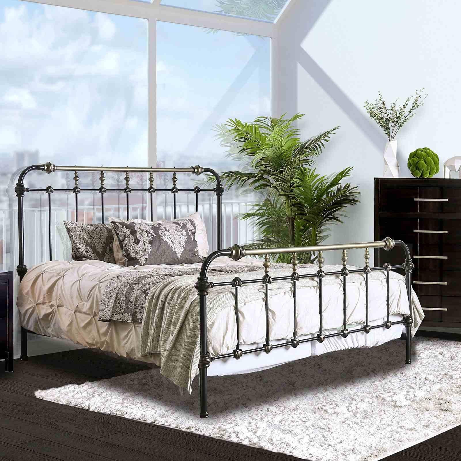 Antique Black King Size Bed with Gold Accents.