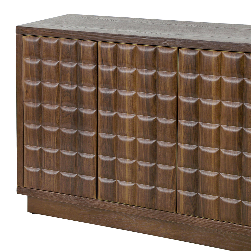 Close-up of cabinet doors with 3D geometric patterns and metal trim, showcasing modern design details.