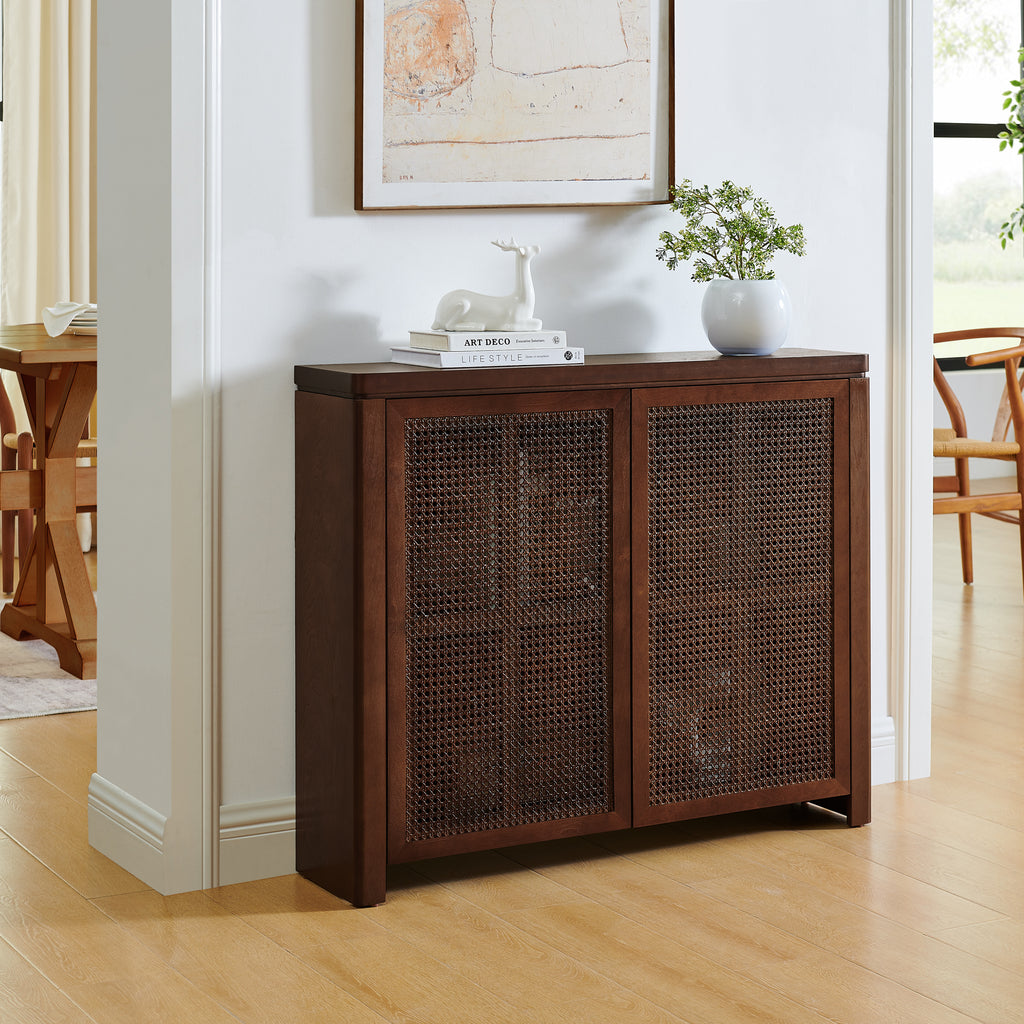 Mid Century Rattan Sideboard Cabinet with Storage in walnut finish placed in entryway, featuring natural rattan doors and smooth curved edges.