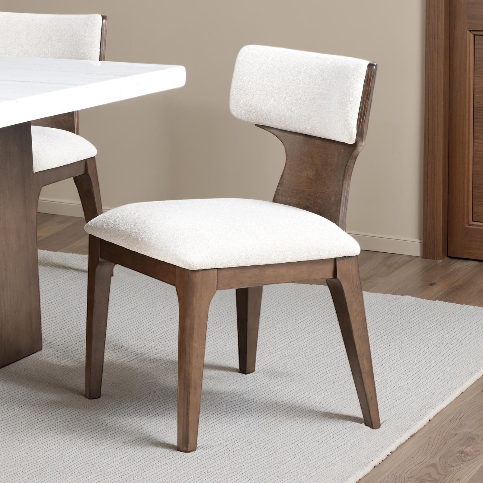Contemporary Dining Chairs - Brown 2pc Set with curved wood backrest and cushioned seat, placed beside a white dining table.