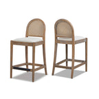 Angled view of Panama 26.5' Rattan Counter Stool Set, showcasing ergonomic curved backs and neutral gray cushioned seats for contemporary bar areas.