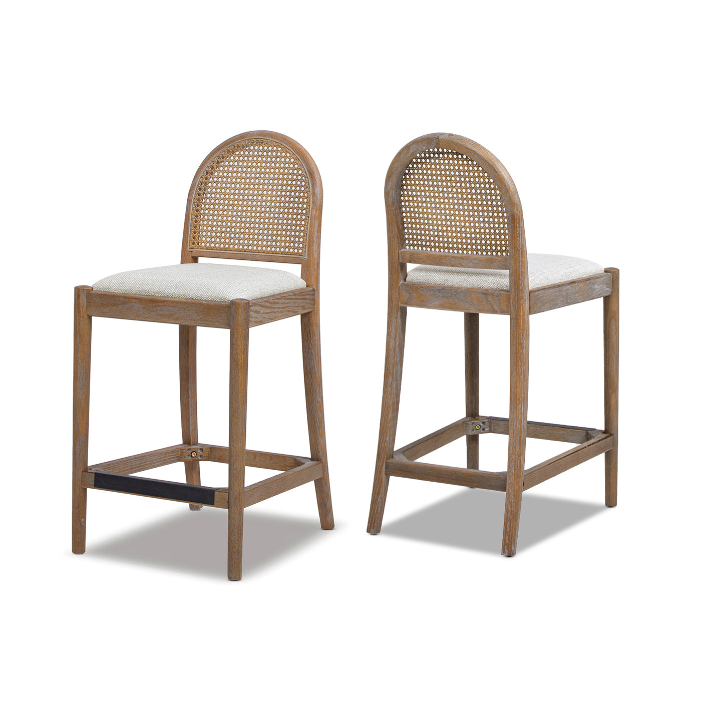 Angled view of Panama 26.5' Rattan Counter Stool Set, showcasing ergonomic curved backs and neutral gray cushioned seats for contemporary bar areas.