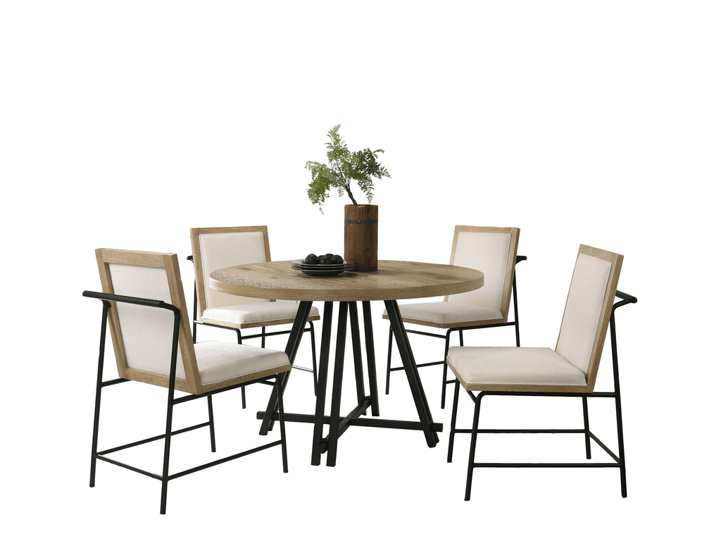 Round Oak Dining Table Set featuring a 47-inch oak-finished table and four cream upholstered chairs with black metal frames.