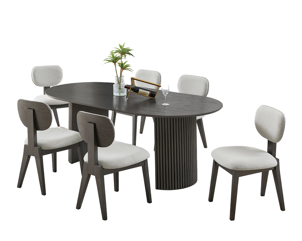 Oval gray oak dining set with fluted pedestal base and six cushioned chairs, showcasing contemporary style and seating for six.