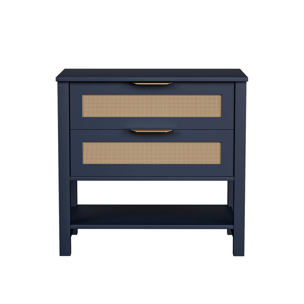 Boho navy blue nightstand with two rattan-front drawers, gold handles, and an open bottom storage shelf.